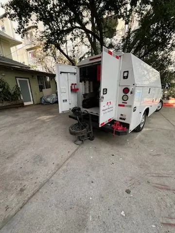 Magnet Plumbing service vehicle on-site for Grease Trap Cleaning in Longboat Key